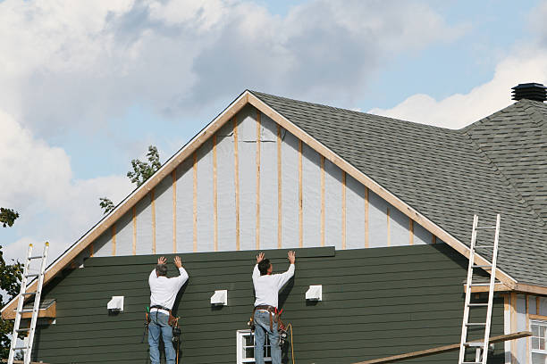 Professional Siding Installation technician working in Rosman, NC
